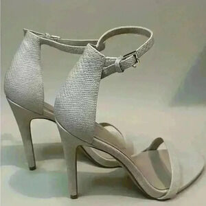 Aldo light tan heels. Ankle strap. Good used condition. Size 9. 3” heel.